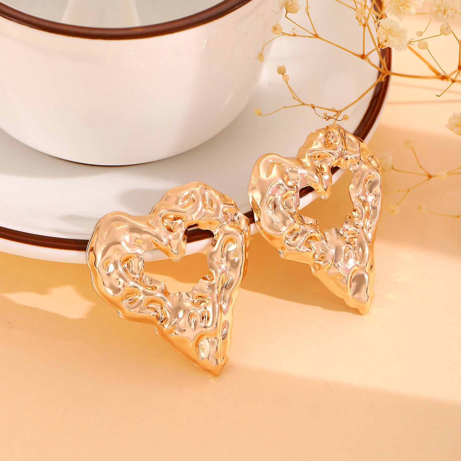 Lava Hollow Heart-shaped Earrings